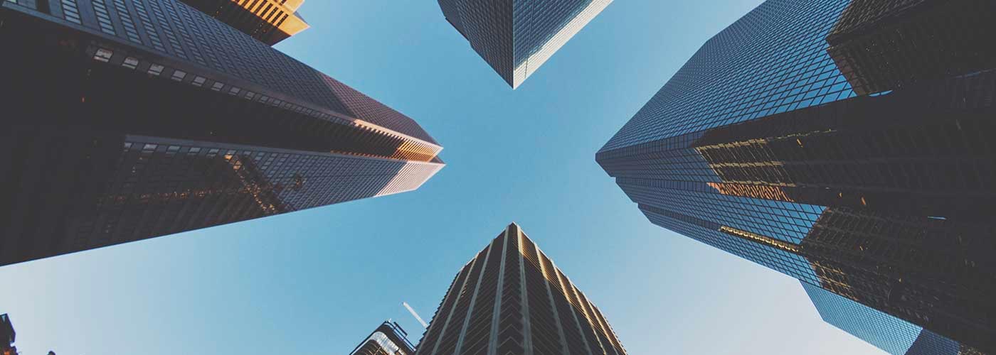 High-rise buildings from below protected by a business insurance policy