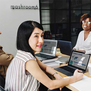 woman working on big project on laptop