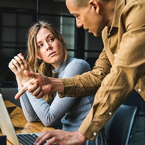 woman listening to concerns of her client