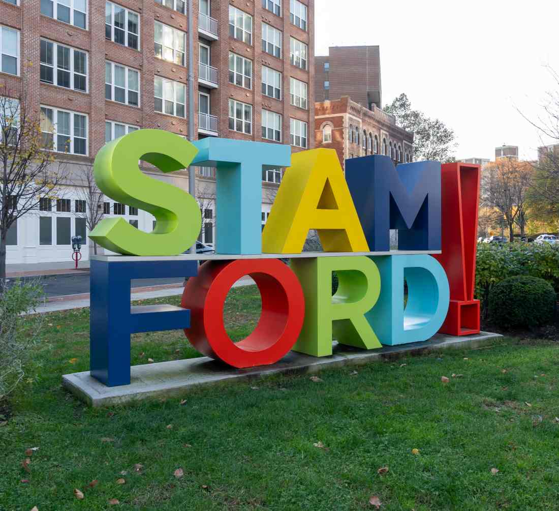 A colorful and big statue of letters, STAM FORD! is seen near the University of Connecticut campus in Stamford, Connecticut, USA, on November 7, 2023. Stamford is a city in Fairfield County, CT.