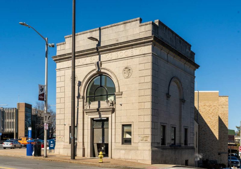 Norwalk, CT - US - Feb 22, 2025 The Norwalk Savings Bank Building, constructed in 1923 at 48 Wall Street, is a Classical Revival structure featuring arched windows and a central bank vault.