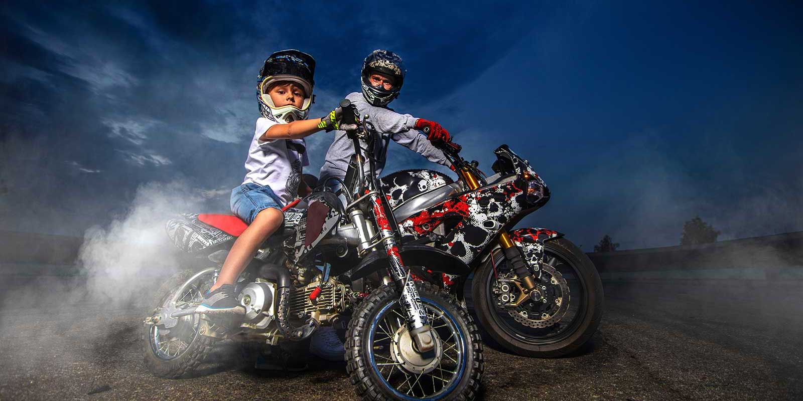 father and son riding motorcycles covered by specialty insurance