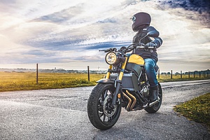 a motorcycle rider who is protected by multiple insurance policies