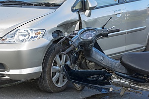 a motorcycle that crashed into a car