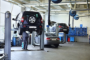 Auto shop garage with cars being repaired