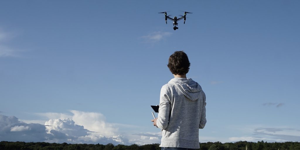 Operator flying drone