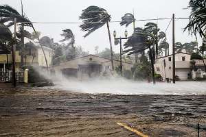 A flooded street after a catastrophic Hurricane. Flood Insurance covers homeowners from such natural disasters.