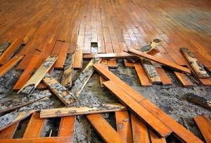 Damaged Parquet flooring tiles. Flood insurance for renters can fund replacement of items like this