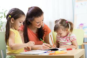 Children at a home with a daycare insurance knowing the cost