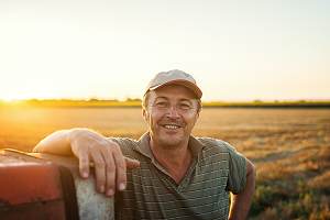 Happy farmer with insurance 