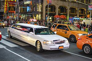 Limo with insurance driving on road 