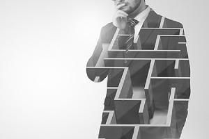 Double exposure image of a man and maze. Personal insurance can appear like a daunting, complex maze
