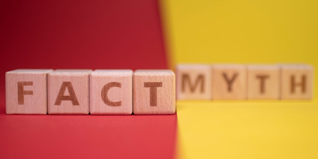 Fact and Myth words arranged in wooden blocks. There are common misconceptions about personal insurance
