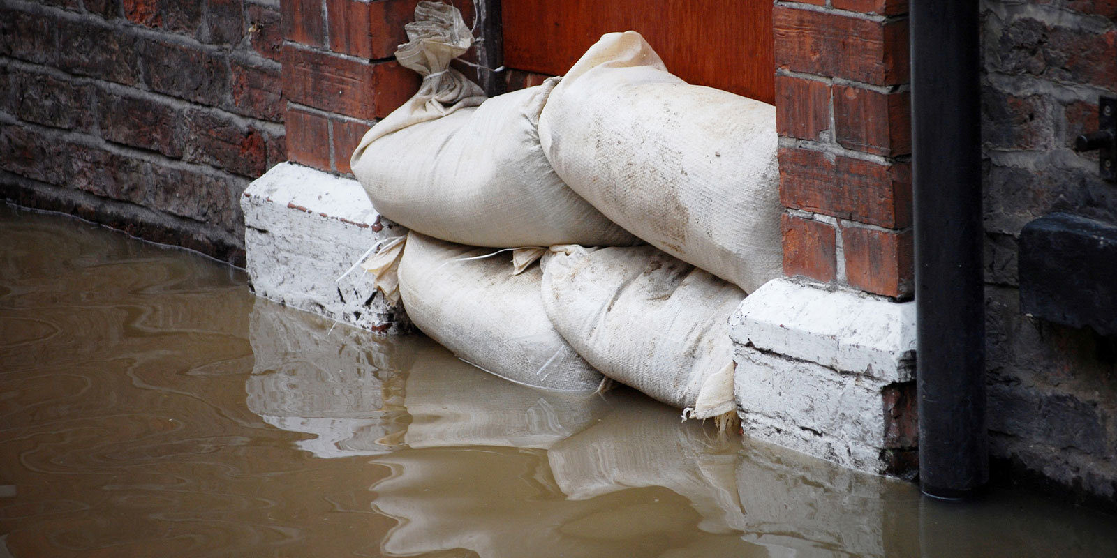 house trying to stop water and needs Commercial Flood Insurance