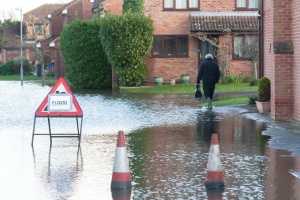 person walking to work going to get Commercial Flood Insurance