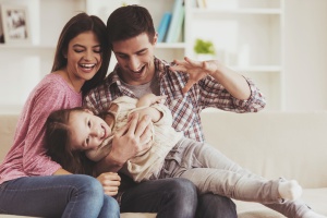 family of 3 happy because they are covered with personal insurance 
