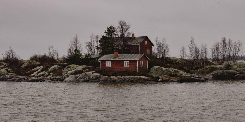house surrounded by water that is wondering When is flood insurance required