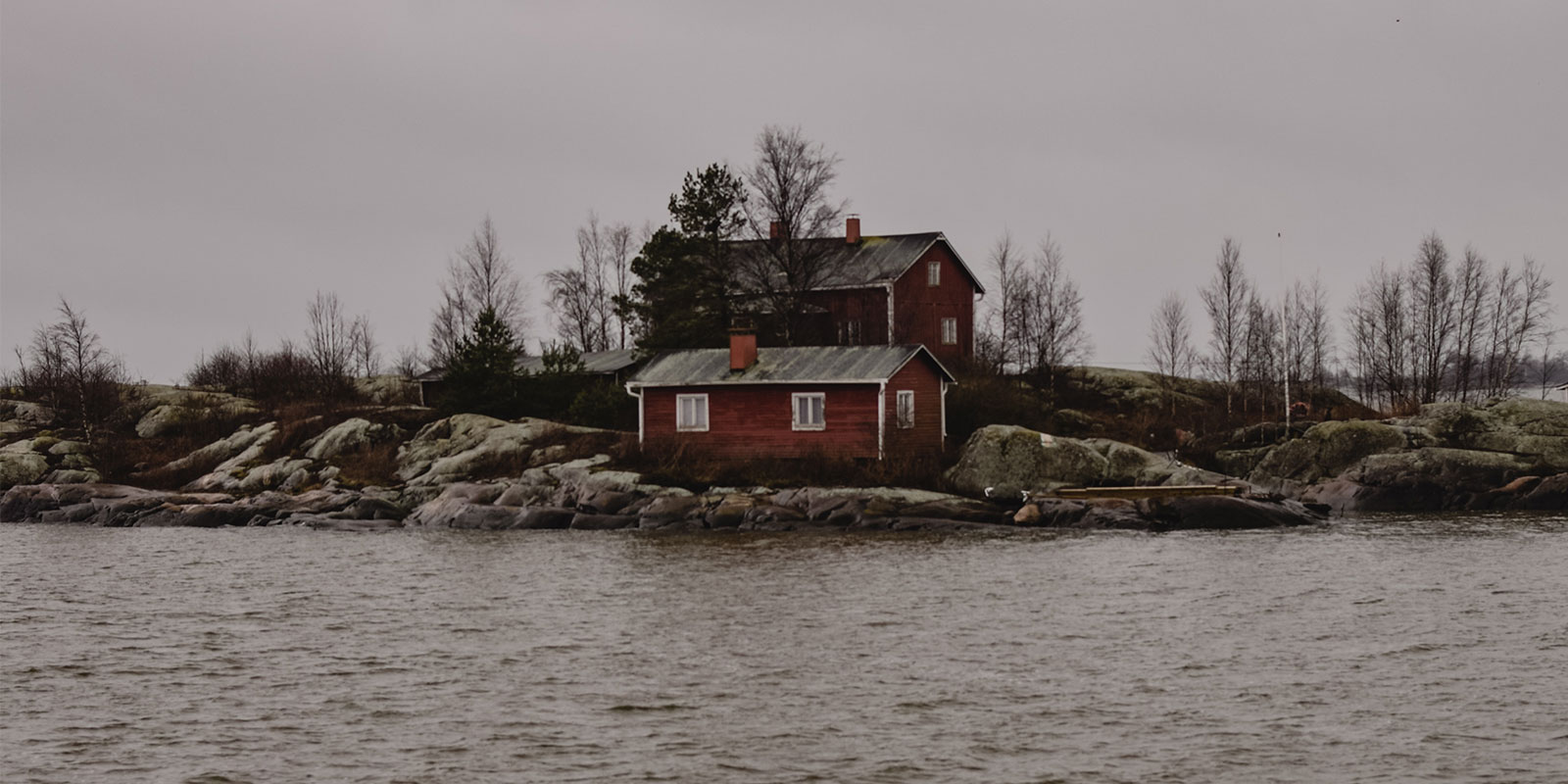house surrounded by water that is wondering When is flood insurance required