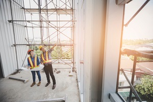 General Contractor Insurance Discussing Building Material