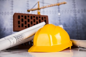 buildings under construction and cranes having construction insurance