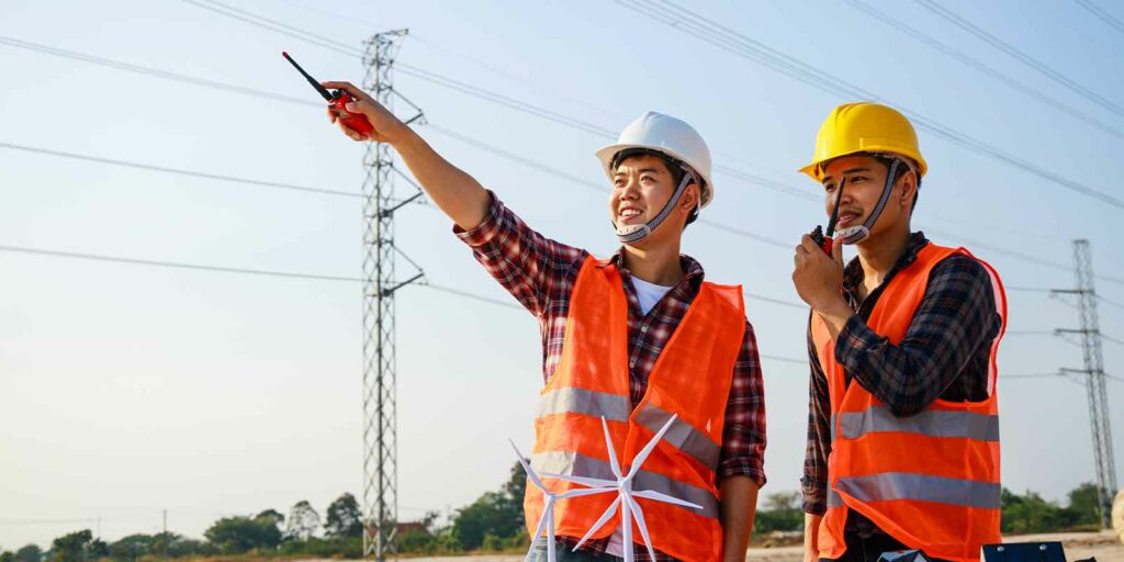two men working and taking about Construction Insurance
