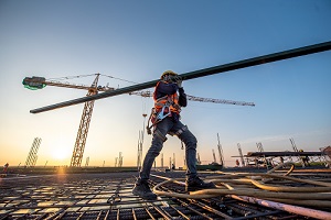 construction worker at construction site with Construction Insurance