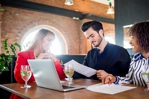 people sitting in th resturant with insurance for franchise business