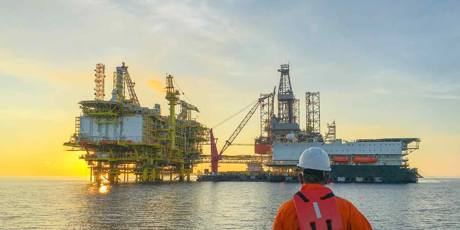 man looking at boat with marine insurance