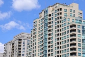 condomium buiding in bright sunny day with Condo Association Insurance