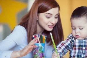 daycare volunteer with child at home