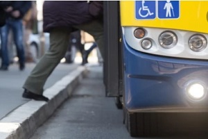 man getting into the bus