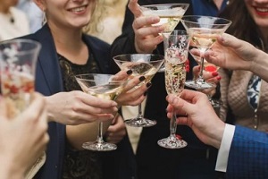 people enjoying drinks in party