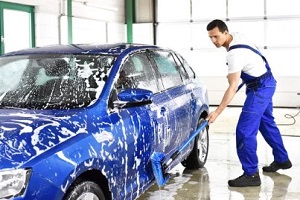 man in car wash station