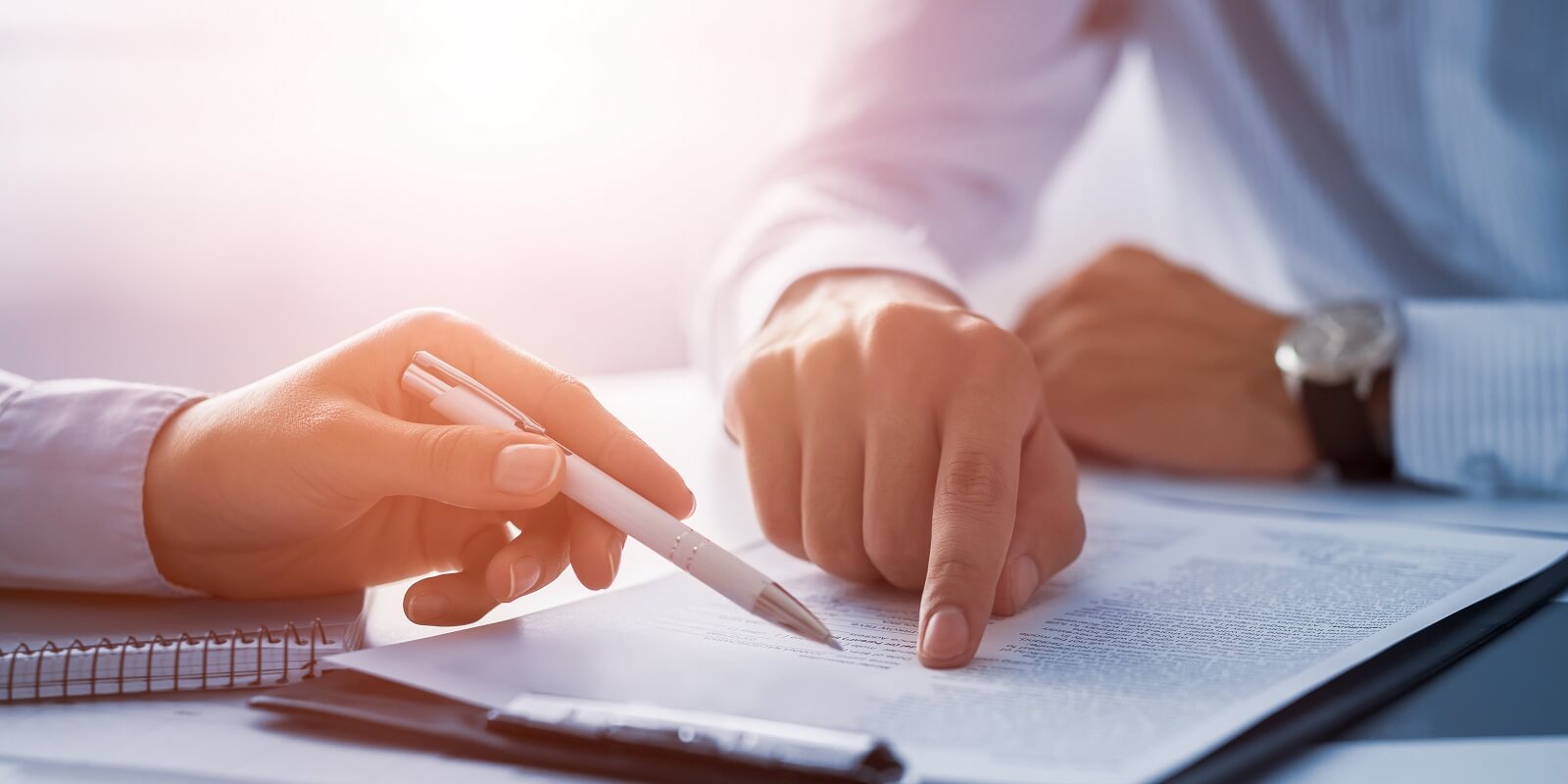 business people negotiating a contract