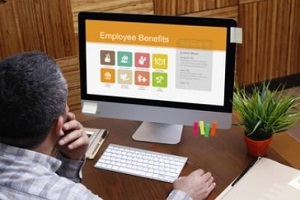 man checking employee benefits online