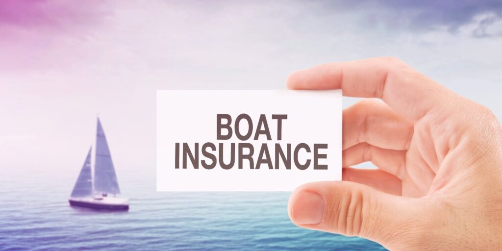 boat insurance agent holding business card
