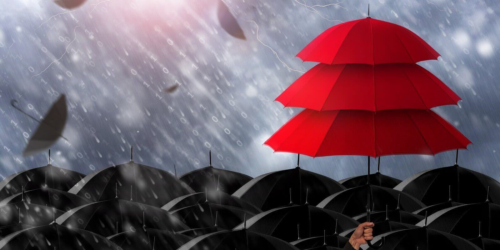 insurance agent holding red umbrella three layers to protect business
