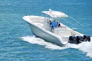 fishingboat powered by three outboard engines