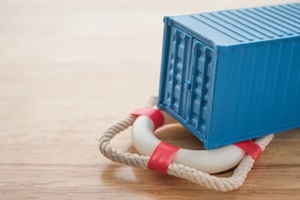 blue container on lifebuoy wooden table background with copy space
