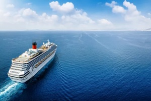 generic cruise ship traveling with speed over blue ocean with copy space