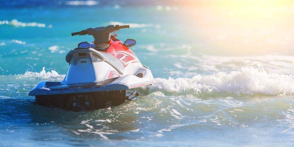 jet ski moored inon on waves of sea