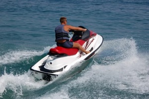 man riding a jet ski