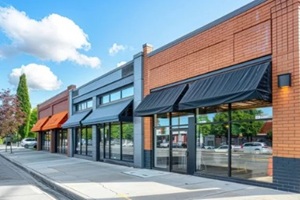 modern versatile space for sale or lease in retail and office building with awning