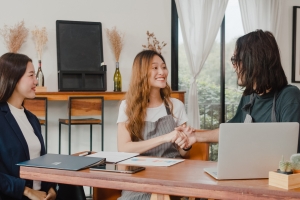 Happy Restaurant Owner Meeting with Retail Insurance Agent