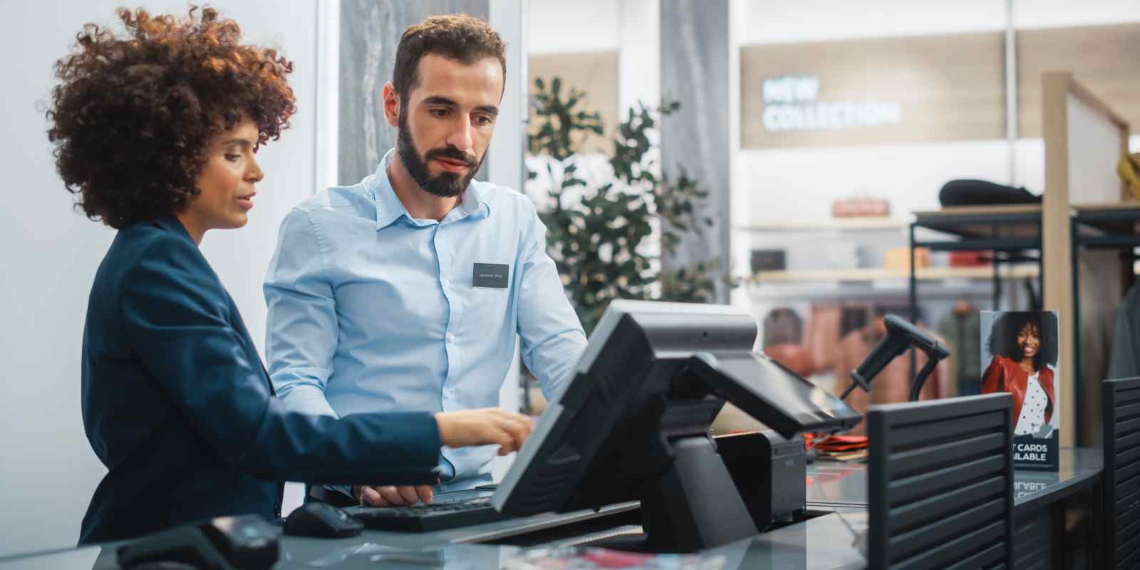 Employees Working on Cash Counter in A Retail Shop