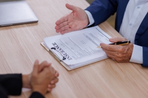 Agent Helping Business Person to Select Right Insurance for His Business