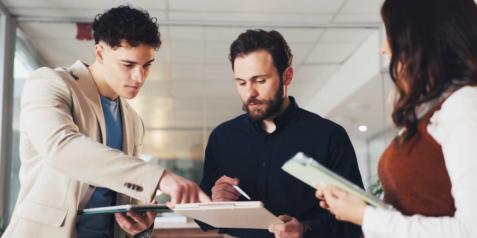 Business People Discussing Strategies to Lower Retail Insurance Premiums