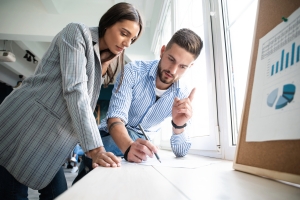 Business Owners Working on Long-Term Risk Management Strategy