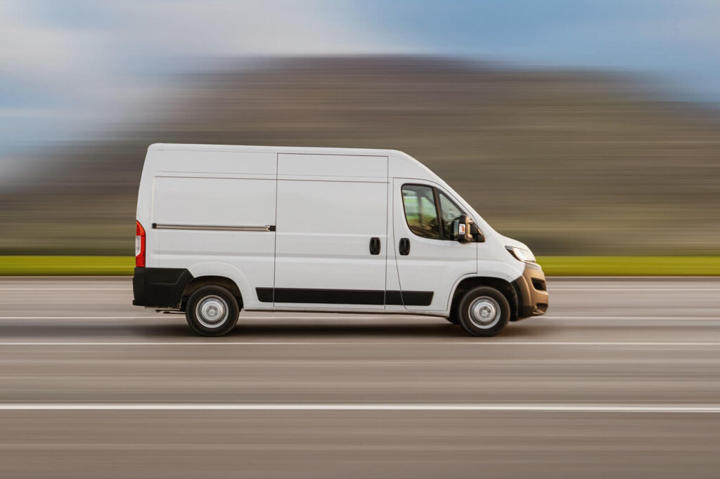 Cargo van driving on the highway