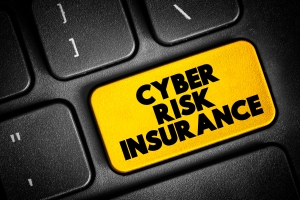 Cyber Risk Insurance Text Button on Keyboard